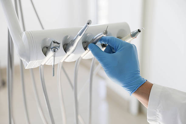 Professional Root Canal Treatment technician working in Calverton, NY